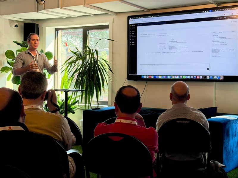 Joel Varty demonstrates an AI agent building and deploying inside Agility CMS to a seated audience at CMS Connect 2026