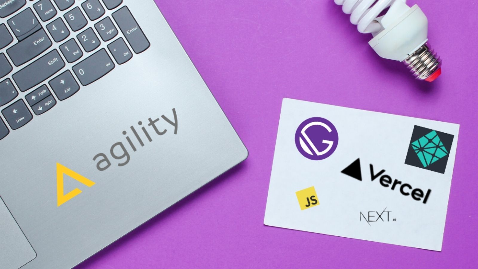 Developer laptop with Agility CMS and Gatsby stickers