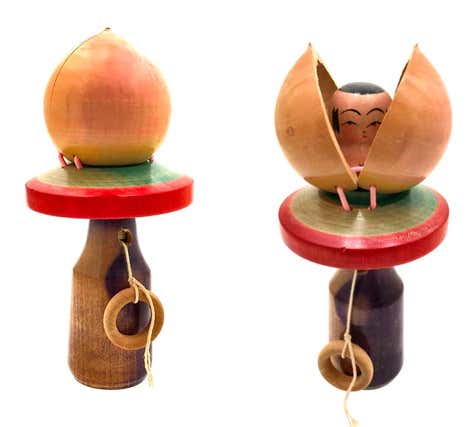 Japanese figure of baby in a peach