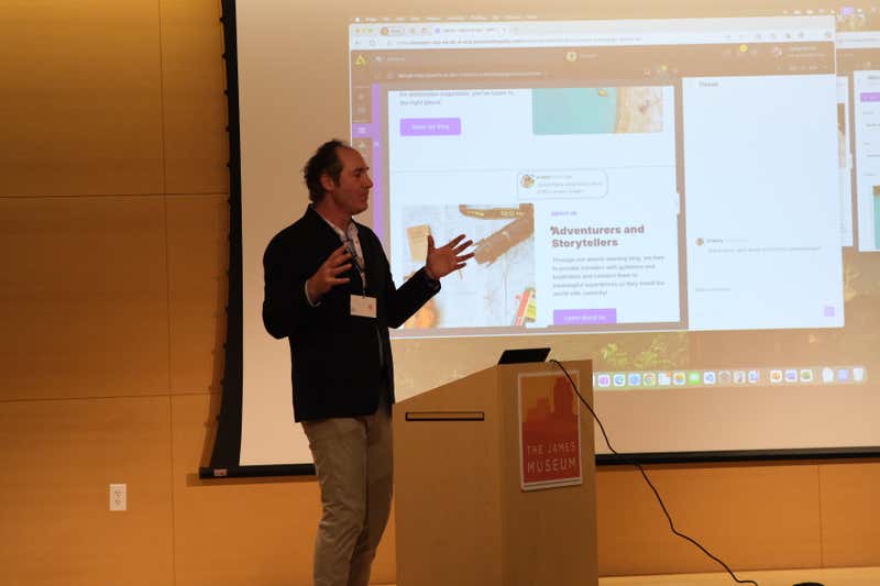 Joel Varty presenting ideas at a conference